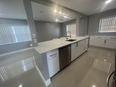 Beautifully updated and modern 2br/2ba home in Leisureville with on Leisureville Community Golf Course in Florida - for sale on GolfHomes.com, golf home, golf lot