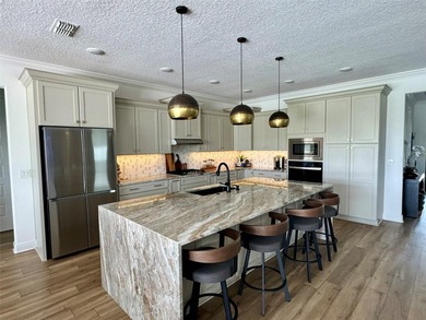 *Your Private Oasis Awaits: Stunning Golf Course Home with on On Top of the World Golf Course in Florida - for sale on GolfHomes.com, golf home, golf lot