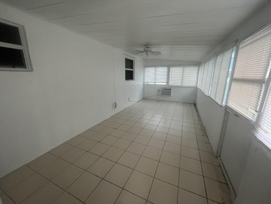 Beautifully updated and modern 2br/2ba home in Leisureville with on Leisureville Community Golf Course in Florida - for sale on GolfHomes.com, golf home, golf lot