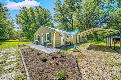 Welcome to this fully renovated 3-bedroom, 2-bath smart home on Village Green Golf Course in Ohio - for sale on GolfHomes.com, golf home, golf lot