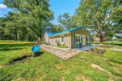 Welcome to this fully renovated 3-bedroom, 2-bath smart home on Village Green Golf Course in Ohio - for sale on GolfHomes.com, golf home, golf lot