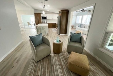 Beautifully renovated 2bd/2ba stucco home. Open concept layout on Del Tura Golf and Country Club in Florida - for sale on GolfHomes.com, golf home, golf lot