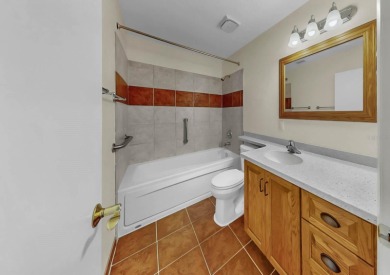 Move-in ready with owned solar (low bills), a private Swim Spa on North Lakes Golf Course in Florida - for sale on GolfHomes.com, golf home, golf lot