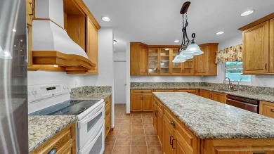 Move-in ready with owned solar (low bills), a private Swim Spa on North Lakes Golf Course in Florida - for sale on GolfHomes.com, golf home, golf lot
