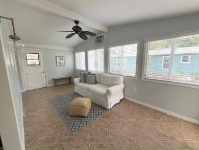 Beautifully renovated 2bd/2ba stucco home. Open concept layout on Del Tura Golf and Country Club in Florida - for sale on GolfHomes.com, golf home, golf lot