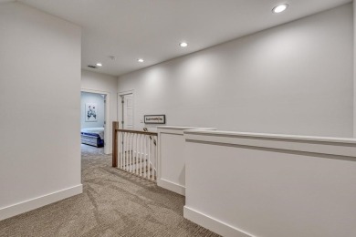 Welcome to this stunning, 4 bedroom/3 bathroom low-maintenance on Woodfin Ridge Golf Club in South Carolina - for sale on GolfHomes.com, golf home, golf lot