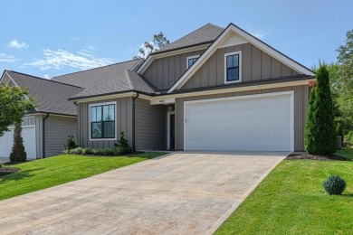 Welcome to this stunning, 4 bedroom/3 bathroom low-maintenance on Woodfin Ridge Golf Club in South Carolina - for sale on GolfHomes.com, golf home, golf lot