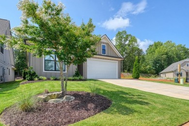 Welcome to this stunning, 4 bedroom/3 bathroom low-maintenance on Woodfin Ridge Golf Club in South Carolina - for sale on GolfHomes.com, golf home, golf lot