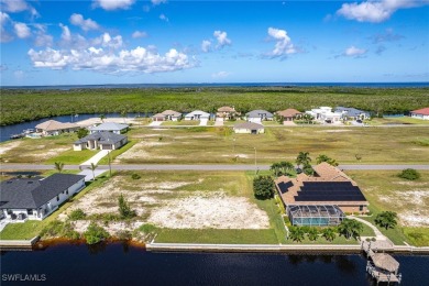 DIRECT GULF ACCESS waterfront property literally feet off the NW on Burnt Store Golf Club in Florida - for sale on GolfHomes.com, golf home, golf lot