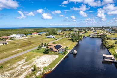 DIRECT GULF ACCESS waterfront property literally feet off the NW on Burnt Store Golf Club in Florida - for sale on GolfHomes.com, golf home, golf lot