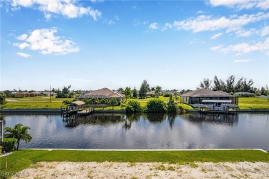 DIRECT GULF ACCESS waterfront property literally feet off the NW on Burnt Store Golf Club in Florida - for sale on GolfHomes.com, golf home, golf lot