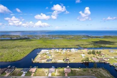 DIRECT GULF ACCESS waterfront property literally feet off the NW on Burnt Store Golf Club in Florida - for sale on GolfHomes.com, golf home, golf lot