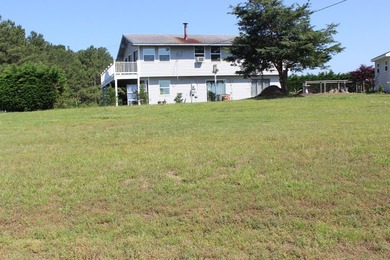 3/1601 Elevated, cleared corner lot with conventional septic on Captains Cove Golf and Yacht Club in Virginia - for sale on GolfHomes.com, golf home, golf lot