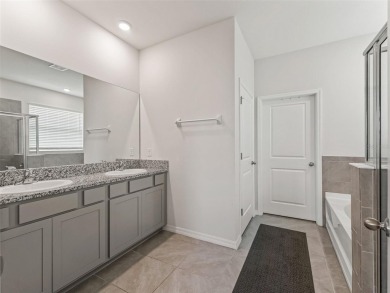 Built in 2023 in the all ages area! This 4 bedroom, 3 full on Trilogy at Ocala Preserve in Florida - for sale on GolfHomes.com, golf home, golf lot