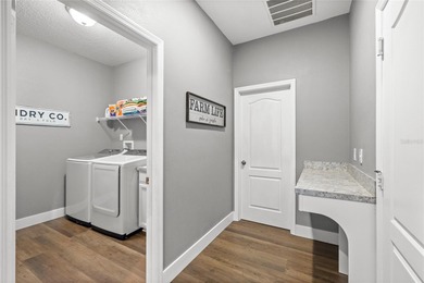 Welcome to 31958 Redtail Reserve Boulevard, a stunning 4-bedroom on Red Tail Golf Club in Florida - for sale on GolfHomes.com, golf home, golf lot