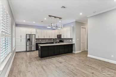 Welcome to this beautifully maintained custom home, thoughtfully on Pensacola Country Club in Florida - for sale on GolfHomes.com, golf home, golf lot