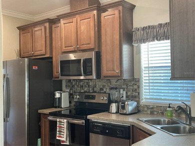 Price deduction on park model. Have you dreamed of living in a on The Groves Golf and Country Club in Florida - for sale on GolfHomes.com, golf home, golf lot