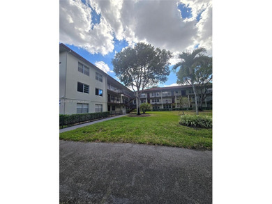 This inviting 2-bedroom, 1.5-bathroom condo on the 2nd floor on Flamingo Lakes Country Club in Florida - for sale on GolfHomes.com, golf home, golf lot