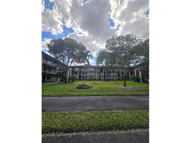 This inviting 2-bedroom, 1.5-bathroom condo on the 2nd floor on Flamingo Lakes Country Club in Florida - for sale on GolfHomes.com, golf home, golf lot