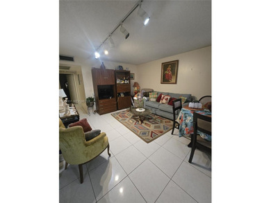 This inviting 2-bedroom, 1.5-bathroom condo on the 2nd floor on Flamingo Lakes Country Club in Florida - for sale on GolfHomes.com, golf home, golf lot