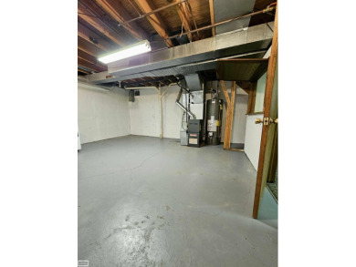 This charming 2-bedroom, 2.5-bath townhouse-style condominium on Marysville Golf Course in Michigan - for sale on GolfHomes.com, golf home, golf lot