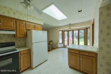 Stunning ranch-style home in River Bend! This one-story offers a on River Bend Golf and Country Club in North Carolina - for sale on GolfHomes.com, golf home, golf lot