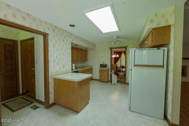 Stunning ranch-style home in River Bend! This one-story offers a on River Bend Golf and Country Club in North Carolina - for sale on GolfHomes.com, golf home, golf lot