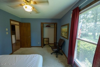 Stunning ranch-style home in River Bend! This one-story offers a on River Bend Golf and Country Club in North Carolina - for sale on GolfHomes.com, golf home, golf lot