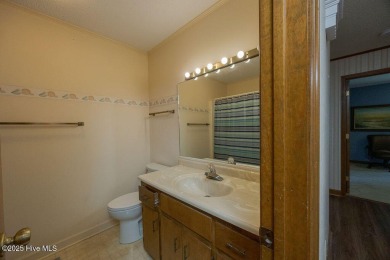 Stunning ranch-style home in River Bend! This one-story offers a on River Bend Golf and Country Club in North Carolina - for sale on GolfHomes.com, golf home, golf lot