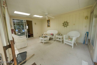 Stunning ranch-style home in River Bend! This one-story offers a on River Bend Golf and Country Club in North Carolina - for sale on GolfHomes.com, golf home, golf lot