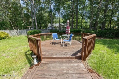 Stunning ranch-style home in River Bend! This one-story offers a on River Bend Golf and Country Club in North Carolina - for sale on GolfHomes.com, golf home, golf lot