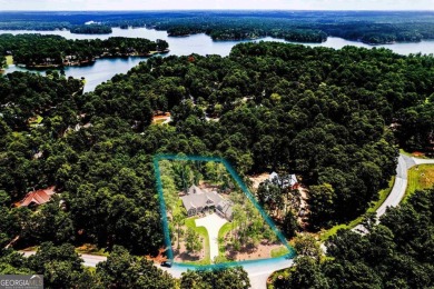 Live the lake life you've always dreamed of in this stunning on Reynolds Lake Oconee - The Oconee in Georgia - for sale on GolfHomes.com, golf home, golf lot