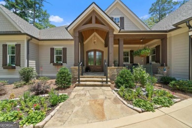 Live the lake life you've always dreamed of in this stunning on Reynolds Lake Oconee - The Oconee in Georgia - for sale on GolfHomes.com, golf home, golf lot