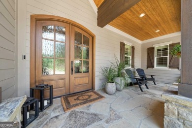 Live the lake life you've always dreamed of in this stunning on Reynolds Lake Oconee - The Oconee in Georgia - for sale on GolfHomes.com, golf home, golf lot