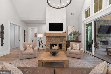 Live the lake life you've always dreamed of in this stunning on Reynolds Lake Oconee - The Oconee in Georgia - for sale on GolfHomes.com, golf home, golf lot