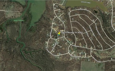 Investment! This perfectly wooded lot nestled right in the on Nocona Hills Golf Course in Texas - for sale on GolfHomes.com, golf home, golf lot