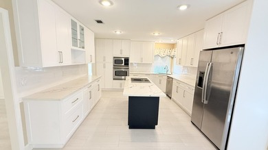 One-of-a-kind Luxurious, Custom-Built Home in Bluewater Bay! on Fairway Oaks at Magnolia Golf Course in Florida - for sale on GolfHomes.com, golf home, golf lot