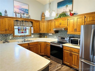 Lakefront Top-Floor Condo with Unbeatable Views of the lake and on Lake Valley Country Club in Missouri - for sale on GolfHomes.com, golf home, golf lot