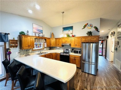 Lakefront Top-Floor Condo with Unbeatable Views of the lake and on Lake Valley Country Club in Missouri - for sale on GolfHomes.com, golf home, golf lot