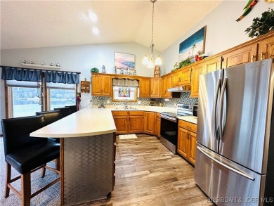 Lakefront Top-Floor Condo with Unbeatable Views of the lake and on Lake Valley Country Club in Missouri - for sale on GolfHomes.com, golf home, golf lot