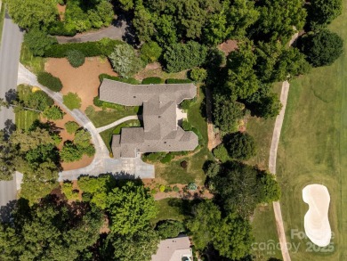 Experience refined living in this exquisite estate nestled on Old North State Club at Uwharrie Point Golf community in North Carolina - for sale on GolfHomes.com, golf home, golf lot