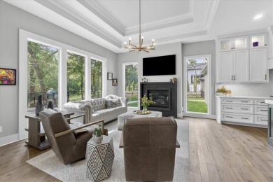 Luxury and modern elegance converge in this custom reverse 1 on Shadow Glen Golf Club in Kansas - for sale on GolfHomes.com, golf home, golf lot