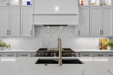 Luxury and modern elegance converge in this custom reverse 1 on Shadow Glen Golf Club in Kansas - for sale on GolfHomes.com, golf home, golf lot