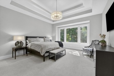 Luxury and modern elegance converge in this custom reverse 1 on Shadow Glen Golf Club in Kansas - for sale on GolfHomes.com, golf home, golf lot