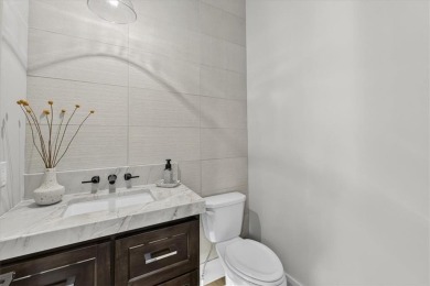 Luxury and modern elegance converge in this custom reverse 1 on Shadow Glen Golf Club in Kansas - for sale on GolfHomes.com, golf home, golf lot
