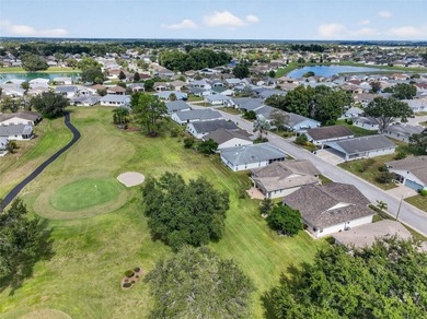 Outstanding GOLF COURSE FRONTAGE home in Highland Fairways! on Highland Fairways Golf Club in Florida - for sale on GolfHomes.com, golf home, golf lot