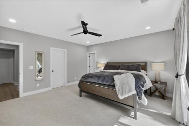 Luxury and modern elegance converge in this custom reverse 1 on Shadow Glen Golf Club in Kansas - for sale on GolfHomes.com, golf home, golf lot