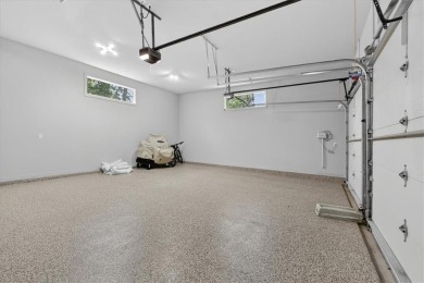 Luxury and modern elegance converge in this custom reverse 1 on Shadow Glen Golf Club in Kansas - for sale on GolfHomes.com, golf home, golf lot