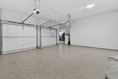 Luxury and modern elegance converge in this custom reverse 1 on Shadow Glen Golf Club in Kansas - for sale on GolfHomes.com, golf home, golf lot