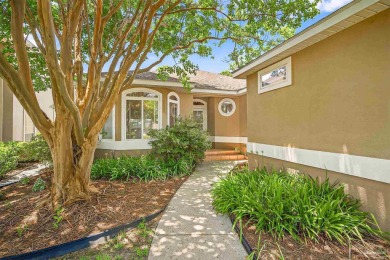 Charming Golf Course Community Home with Canal Views in Tiger on Tiger Point Golf and Country Club in Florida - for sale on GolfHomes.com, golf home, golf lot